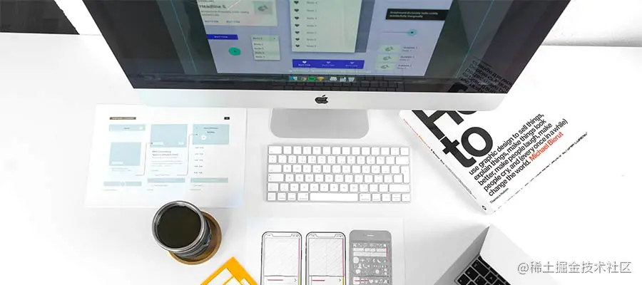 Project user interface elements displayed on a screen and a desk