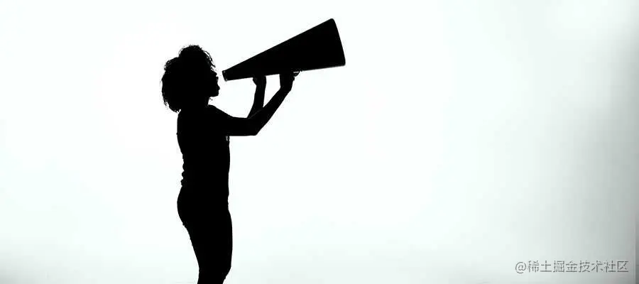 A person speaks into a megaphone.