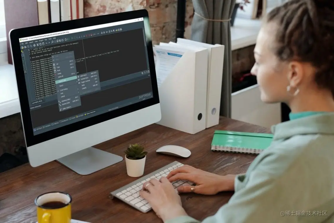 The best data visualization library for Python running on an iMac with a woman looking at the screen's display