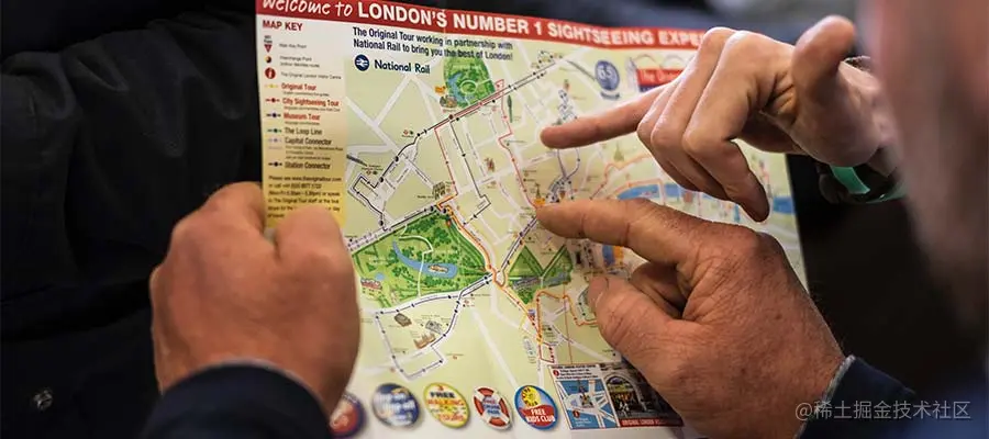 People point to places on a map