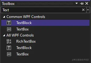 “工具箱”窗口的屏幕截图，其中在“常用 WPF 控件”列表中选择了 TextBlock 控件。